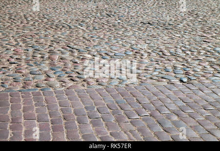 Stone road and pawement in small city. Stock Photo