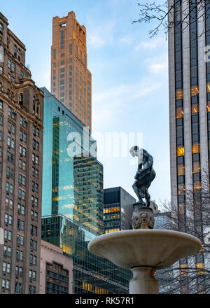 New York, USA, 5 February 2019.  The Pulitzer fountain is seen among buildings at Manhattan's  Grand Army Plaza next to New York City's Central Park.  Stock Photo