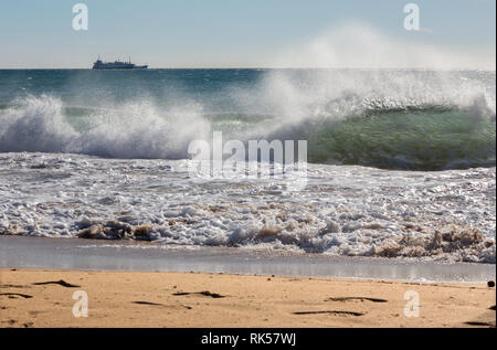 Palma de Mallorca - The big wave and the cargo in background. Stock Photo