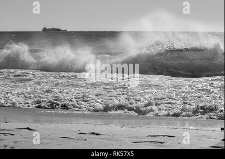 Palma de Mallorca - The big wave and the cargo in background. Stock Photo