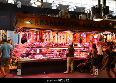BARCELONA, SPAIN - JULY 13, 2018: people shop in Barcelona Market (Mercat de Sant Josep de la Boqueria), a large public market with entrance near La R Stock Photo