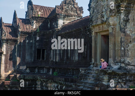 Part of the galleried wall around the second level of the central temple complex, Angkor Wat, Siem Reap, Cambodia Stock Photo