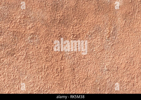 Texture red painted with uneven wall for the background of the inscriptions Stock Photo