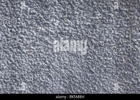 Texture gray painted uneven wall for the background of the inscriptions Stock Photo