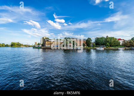BERLIN - SEPTEMBER 09, 2018: Industrial buildings on the banks of the Spree and Havel River of the historic center of Altstadt Spandau. Stock Photo