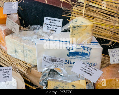 Artisan cheese stall, cheeses on display, Leith Saturday market, Dock Place, Edinburgh, Scotland, UK Stock Photo