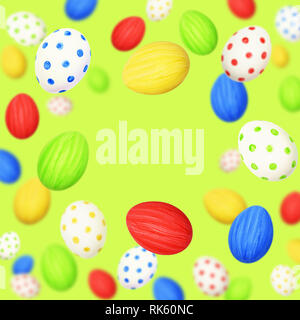 Cololrful Easter eggs scattered on green background Stock Photo