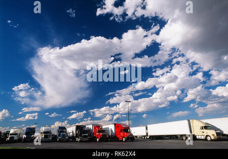 Tractor trailer trucks parked at a truck stop in Wyoming, USA Stock Photo