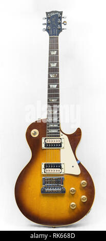 Riga, Latvia - march 2018, 1964 Gibson Les Paul model guitar in sunburst cherry , showing body, neck, fretboard. Stock Photo