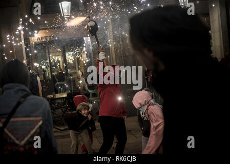 Barcelona, Catalonia, Spain. 9th Feb, 2019. Young revelers enjoy a correfoc or runfire for the Santa Eulalia festival in the streets of the Gothic Quarter in Barcelona. Correfocs, an old Catalan tradition where people dressed as devils blow up firecrackers and flares, take part in many local celebrations and festivals. Credit: Jordi Boixareu/ZUMA Wire/Alamy Live News Stock Photo