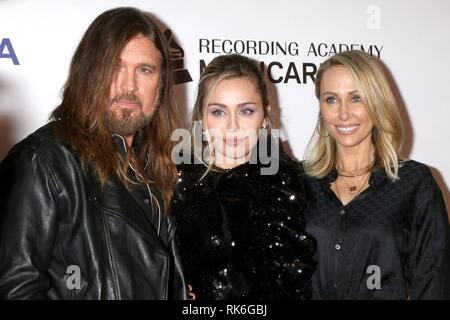 Billy Ray Cyrus, Miley Cyrus, Tish Cyrus at arrivals for 2019 MusiCares Person of the Year Tribute, Los Angeles Convention Center, Los Angeles, CA February 8, 2019. Photo By: Priscilla Grant/Everett Collection Stock Photo