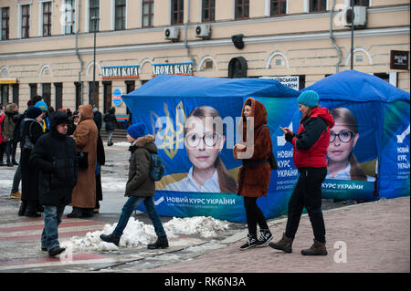 Kiev, Ukraine. 9th Feb 2019. People are seen walking past a campaign tent of Ukrainian presidential candidate Yulia Tymoshenko leader of the Ukrainian Batkivshchyna (Fatherland) political party.  Presidential elections in Ukraine will be held March 31, 2019. Credit: SOPA Images Limited/Alamy Live News Stock Photo