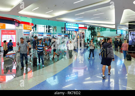 DUBAI, UAE - CIRCA JUNE, 2015: inside of Dubai International Airport. Dubai International Airport is the primary airport serving Dubai, United Arab Em Stock Photo