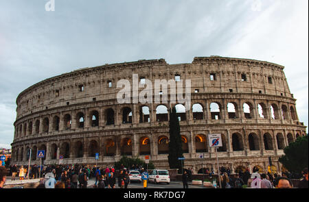 Outside View of the Roman Coliseum. Lots of tourists on the outside. Stock Photo