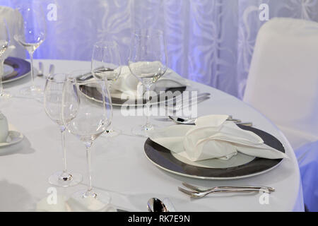 Table set for an event party or wedding reception, luxury elegant table setting dinner Stock Photo