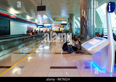 DUBAI, UAE - CIRCA JUNE, 2015: inside of Dubai International Airport. Dubai International Airport is the primary airport serving Dubai, United Arab Em Stock Photo