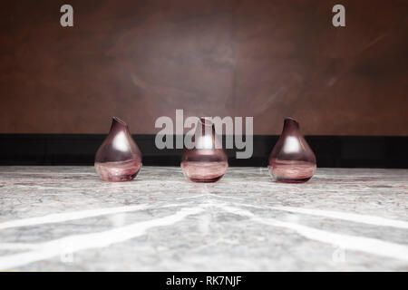 Three Glass Vases on Granite surface - detail in a luxury appartment Stock Photo