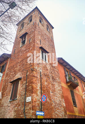 Asti, Italy - January 1, 2019. Torre dei Natta Tower. View from the Via Milliavacca with Via Natta corner. Asti, Piedmont, Italy. Stock Photo