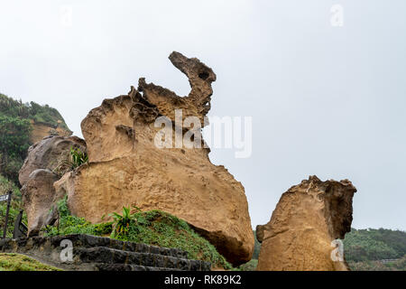 Yehliu Natural Landscape at Yehliu Geopark in Taiwan.  Yehliu Geopark is home to a number of unique geological formations. Stock Photo