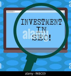 Word writing text Investment In Seo. Business concept for pay money to improve visibility of website search engine Magnifying Glass Enlarging Tablet B Stock Photo