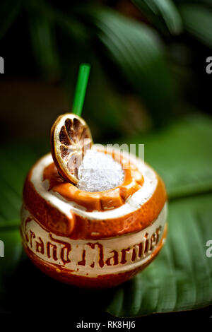 Vertical photo of a Tiki cocktail served in a Grand-Marnier cup Stock Photo