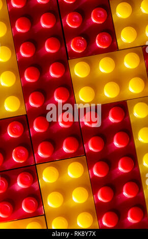 Plastic geometric cubes. Construction toy solid background from designer constructor. Multi-colored cubes. Geometric background. Children's toy. Circl Stock Photo