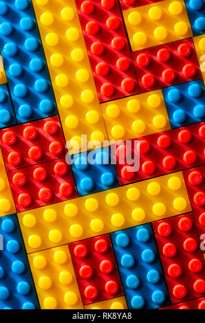 Plastic geometric cubes. Construction toy solid background from designer constructor. Multi-colored cubes. Geometric background. Children's toy. Circl Stock Photo