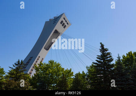 The tower of Olympic Stadium seen from the Montreal Botanical Garden, a large botanical garden in Montreal, Quebec, Canada. Stock Photo