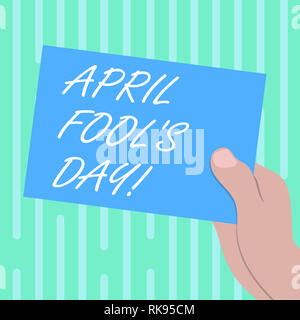 Word writing text April Fool S Is Day. Business concept for fixed date that has occasion for playing tricks Drawn Hu analysis Hand Holding Presenting  Stock Photo