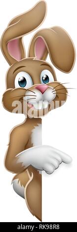 Easter Bunny Rabbit Pointing Cartoon at Sign Stock Vector