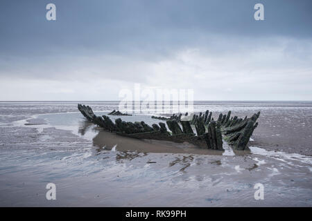 Shipwreck of the SS Nornen uncovered by the low tide at Berrow Sands, Burnham on Sea, Somerset, UK Stock Photo