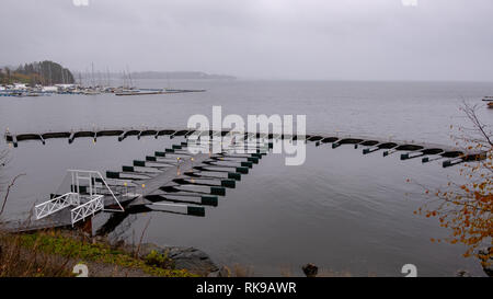 Empty boat docks in Norway during autumn Stock Photo