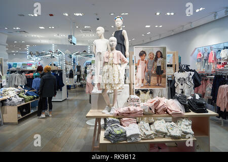 NEW YORK CIRCA MARCH 2016 interior of Times Square H M store. H M Hennes Mauritz AB is a Swedish multinational retail clothing company known f Stock Photo Alamy