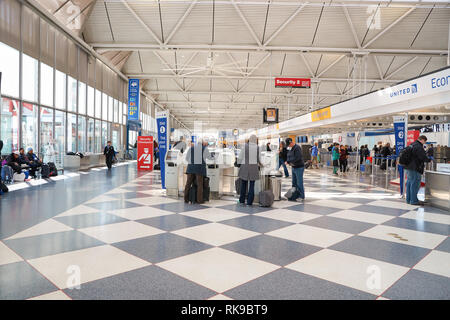 CHICAGO - APRIL 05, 2016: inside of O'Hare International Airport. O'Hare is currently a major hub for American Airlines and United Airlines, as well a Stock Photo