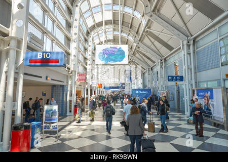 CHICAGO - APRIL 05, 2016: inside of O'Hare International Airport. O'Hare is currently a major hub for American Airlines and United Airlines, as well a Stock Photo