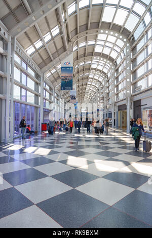 CHICAGO - APRIL 05, 2016: inside of O'Hare International Airport. O'Hare is currently a major hub for American Airlines and United Airlines, as well a Stock Photo