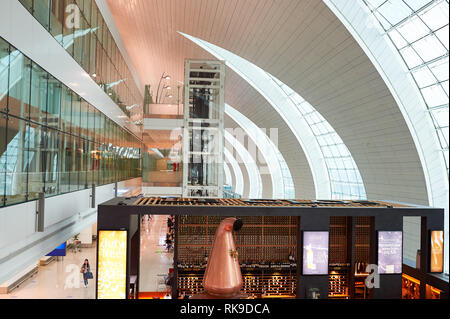 DUBAI, UAE - CIRCA JUNE, 2015: inside of Dubai International Airport. Dubai International Airport is the primary airport serving Dubai, United Arab Em Stock Photo