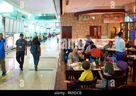 DUBAI, UAE - CIRCA JUNE, 2015: inside of Dubai International Airport. Dubai International Airport is the primary airport serving Dubai, United Arab Em Stock Photo