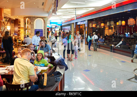 DUBAI, UAE - CIRCA JUNE, 2015: inside of Dubai International Airport. Dubai International Airport is the primary airport serving Dubai, United Arab Em Stock Photo