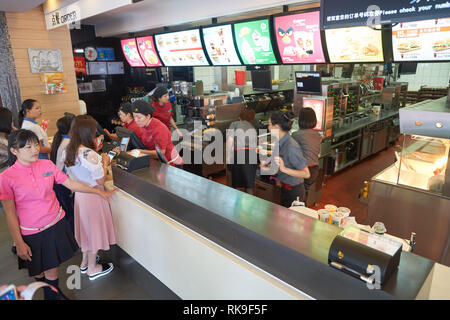 SHENZHEN, CHINA - MAY 06, 2016: inside of McDonald's restaurant. McDonald's is the world's largest chain of hamburger fast food restaurants, founded i Stock Photo