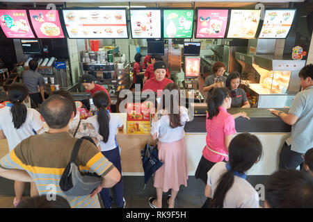 SHENZHEN, CHINA - MAY 06, 2016: inside of McDonald's restaurant. McDonald's is the world's largest chain of hamburger fast food restaurants, founded i Stock Photo