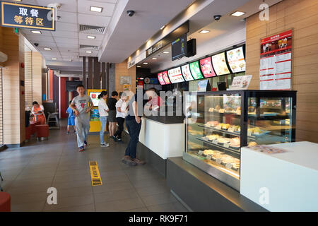 SHENZHEN, CHINA - MAY 06, 2016: inside of McDonald's restaurant. McDonald's is the world's largest chain of hamburger fast food restaurants, founded i Stock Photo