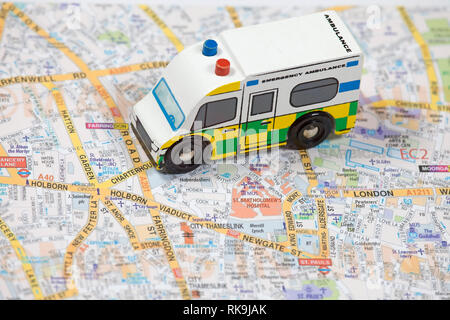 Toy Ambulance on map of London uk Stock Photo