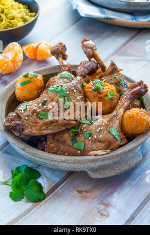 Duck tagine with clementines and citrus couscous Stock Photo