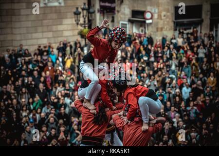 Barcelona, Spain. 10 February, 2019:  The 'Castellers de Barcelona' build one of their human towers during Barcelona's city holiday 'La Merce' Credit: Matthias Oesterle/Alamy Live News Stock Photo