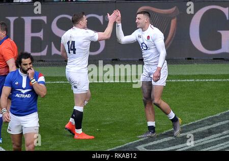 London, UK. 10th Feb 2019. Hatrick man Jonny May (England, right) is congratulated by Chris Ashton (England, 14). England V France. Guinness six nations rugby. Twickenham stadium. London. UK. 10/02/2019. Credit: Sport In Pictures/Alamy Live News Stock Photo