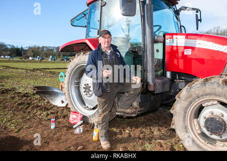 Timogeague, Cork, Ireland. 10th Feb, 2019. Tadgh O'Driscoll from Enniskeane makes time for tea and a sandwich at the West Cork Ploughing Association match that was held in Timoleague, Co. Cork, Ireland Credit: David Creedon/Alamy Live News Stock Photo