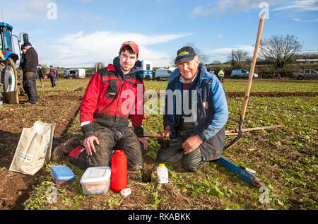 Timogeague, Cork, Ireland. 10th Feb, 2019. Cian Harrington and Dan O'Driscoll from Bandon preepare for luanch at the West Cork Ploughing Association match that was held in Timoleague, Co. Cork, Ireland Credit: David Creedon/Alamy Live News Stock Photo