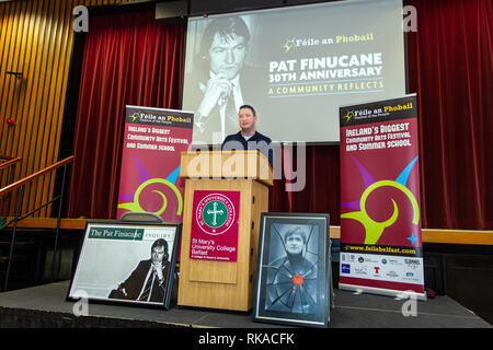 Falls Road, Belfast, Northern Ireland, UK. 10th February 2019. John Finucane (Son of murdered Human Rights lawyer Pat Finucan) Addressing a large crowd at “A Community Reflects' on the murder of Pat Finucane. The Family are still waiting for a Full Public enquiry in to the Solicitors Murder. Credit: Bonzo/Alamy Live News Stock Photo