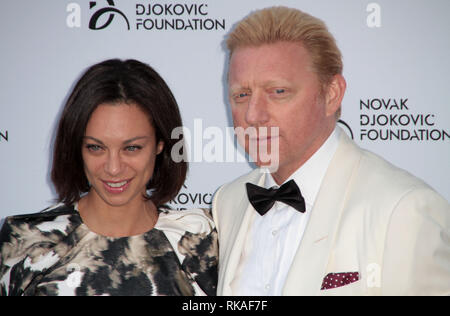 Boris Becker and Lilly Becker arrive at The Novak Djokovic Foundation London Gala Dinner at The Roundhouse Theatre, Chalk Farm, North London. The Foun Stock Photo